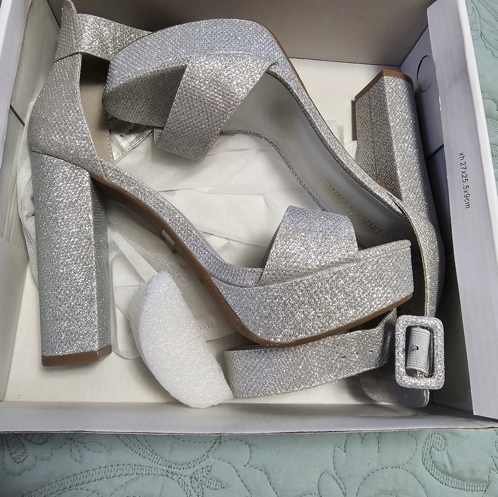 Silver platform heels.